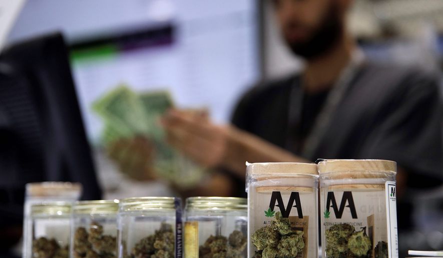 Nevada state officials will allow marijuana businesses to deal in electronic tokens and chips as dispensaries are increasingly targeted for burglaries and robberies. (ASSOCIATED PRESS)