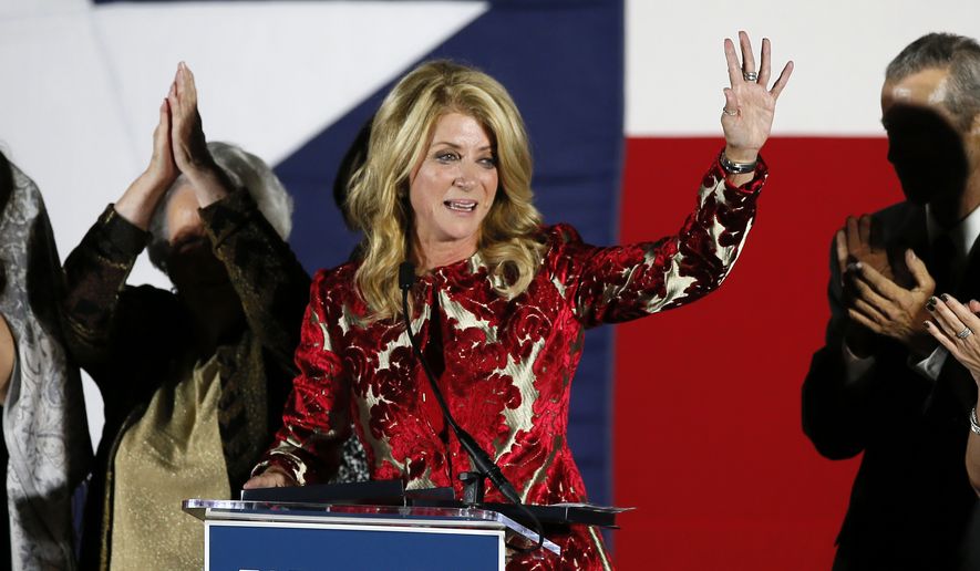 In this Nov. 4, 2014, file photo, Texas Democratic gubernatorial candidate Wendy Davis waves to supporters after making her concession speech in Fort Worth, Texas. Davis announced on Monday, July 22, 2019, that she&#x27;s running for Congress in 2020. (AP Photo/Tony Gutierrez, File)