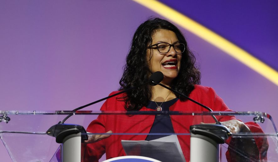 Rep. Rashida Tlaib, D-Mich., addresses the 110th NAACP National Convention, Monday, July 22, 2019, in Detroit. (AP Photo/Carlos Osorio)