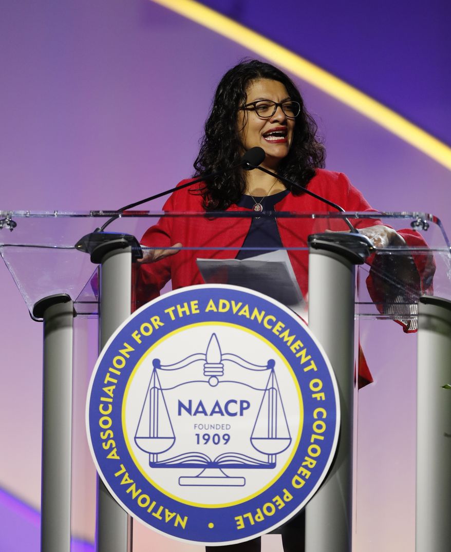 Rep. Rashida Tlaib, D-Mich., addresses the 110th NAACP National Convention, Monday, July 22, 2019, in Detroit. (AP Photo/Carlos Osorio)
