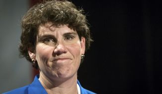 FILE - In this Nov. 6, 2018, file photo, Amy McGrath speaks to supporters in Richmond, Ky. Democratic candidates in some key states in the 2020 race aren’t going along as some in the party’s presidential field takes a liberal turn. Among the latest discordant voice is Amy McGrath of Kentucky, a Marine running against Senate Majority Leader Mitch McConnell. (AP Photo/Bryan Woolston, File)