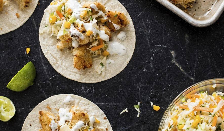 This undated photo provided by America's Test Kitchen in July 2019 shows Baja-Style Cauliflower Tacos in Brookline, Mass. This recipe appears in the cookbook “Vegan for Everybody.” (Daniel J. van Ackere/America's Test Kitchen via AP)
