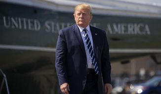 FILE -  In this Sunday, July 21, 2019 file photo, President Donald Trump walks on the tarmac to board Air Force One at Morristown Municipal Airport, in Morristown, N.J. Iran said Monday that it has arrested 17 Iranian nationals allegedly recruited by the Central Intelligence Agency to spy on the country&#39;s nuclear and military sites, and some of them have already been sentenced to death. Trump tweeted that the claim had &amp;quot;zero truth,&amp;quot; calling Iran a &amp;quot;total mess.&amp;quot;(AP Photo/Manuel Balce Ceneta, File)