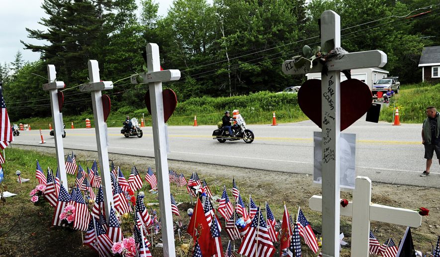 FILE - In this July 6, 2019, file photo, motorcyclists participate in a ride in Randolph, N.H., to remember seven bikers killed there in a collision with a pickup truck in June. State transportation officials in Massachusetts are expected to be questioned during a legislative oversight hearing on Monday, July 22, 2019, in Boston, about the Registry of Motor Vehicles' failure to suspend the commercial license of the truck driver charged in the crash that killed the seven motorcyclists in New Hampshire. (Paul Hayes/Caledonian-Record via AP, File)