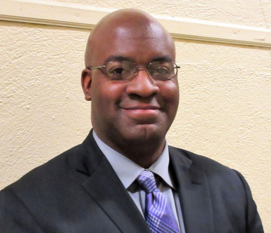 FILE - This undated photo provided by Westfield Public Schools in Westfield, N.J., shows Westfield High School principal Dr. Derrick Nelson, who died after donating bone marrow to a 14-year-old student in France. Nelson's fiancée, Sheronda Braker, has filed a wrongful death lawsuit Monday, July 22, 2019, which names Hackensack University Medical Center. The 44-year-old Nelson died in April, several weeks after lapsing into a coma during the procedure. (Westfield Public Schools via AP)