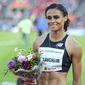 FILE - In this June 13, 2019, file photo, Sydney McLaughlin of the United States poses after winning women&#39;s 400m hurdles event at the IAAF Diamond League athletics competition in Oslo, Norway. About to turn 20 next month, she&#39;s juggling quite a few things these days _ new coach, living on the West Coast, making the transition from college to the pro circuit and the weight of lofty expectations. Her name constantly surfaces among the ones to watch heading into the Tokyo Games next summer.(Lise Aserud/NTB Scanpix via AP, File)