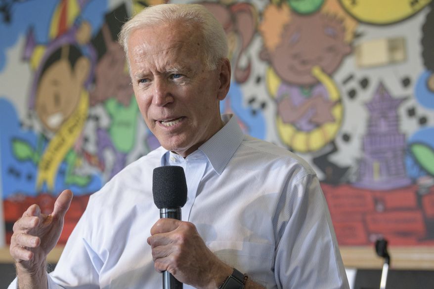 Democratic presidential candidate former Vice President Joe Biden tours the Youth Empowerment Project Bike Works that targets at risk youth and young people in New Orleans, Tuesday, July 23, 2019. (AP Photo/Matthew Hinton)