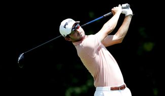 Andrew Landry hits off the second tee during the final round of the John Deere Classic golf tournament, Sunday, July 14, 2019, at TPC Deere Run in Silvis, Ill. (AP Photo/Charlie Neibergall)