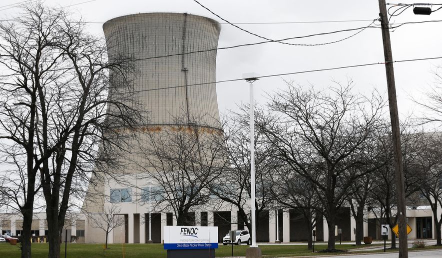 FILE - Davis-Besse Nuclear Power Station shown in a Tuesday, April 4, 2017 file photo, in Oak Harbor, Ohio. A roughly $1 billion financial rescue for Ohio's two nuclear power plants is all but certain after lawmakers on Tuesday, July 23, 2019 approved adding a new fee to every electricity bill in the state. (AP Photo/Ron Schwane, File)
