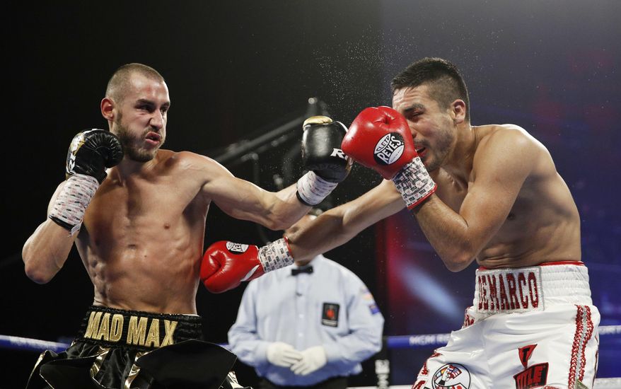FILE - In this Oct. 20, 2018, file photo, Maxim Dadashev, of Russia, left, hits Antonio DeMarco, of Mexico, during a junior welterweight bout  in Las Vegas. Maxim Dadashev has died after suffering a brain injury in a fight in Maryland. He was 28.The Russian Boxing Federation said Tuesday, July 23, 2019, that Dadashev died &amp;quot;as a result of the injuries he sustained&amp;quot; in Friday&#39;s, July 19, 2019, light-welterweight fight with Subriel Matias at the Theater at MGM National Harbor in Oxon Hill, Maryland. (AP Photo/John Locher, File)