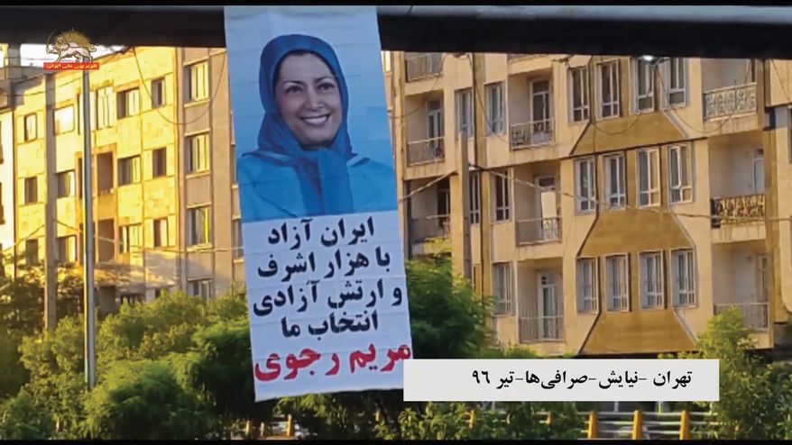 A Maryam Rajavi poster hangs from an overpass in a major expressway in Tehran. After stealing the identity of a French diplomat in Jerusalem, Iran had him tweet that Ms. Rajavi, head of the biggest Iranian dissident group, had visited archenemy Israel to set anti-Iran strategy.

