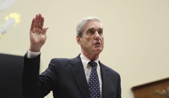 Former special counsel Robert Mueller, is sworn in before he testifies before the House Judiciary Committee hearing on his report on Russian election interference, on Capitol Hill, in Washington, Wednesday, July 24, 2019. (AP Photo/Andrew Harnik)