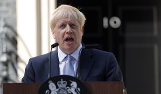 Britain&#x27;s new Prime Minister Boris Johnson speaks outside 10 Downing Street, London, Wednesday, July 24, 2019. Boris Johnson has replaced Theresa May as Prime Minister, following her resignation last month after Parliament repeatedly rejected the Brexit withdrawal agreement she struck with the European Union. (AP Photo/Frank Augstein) **FILE**