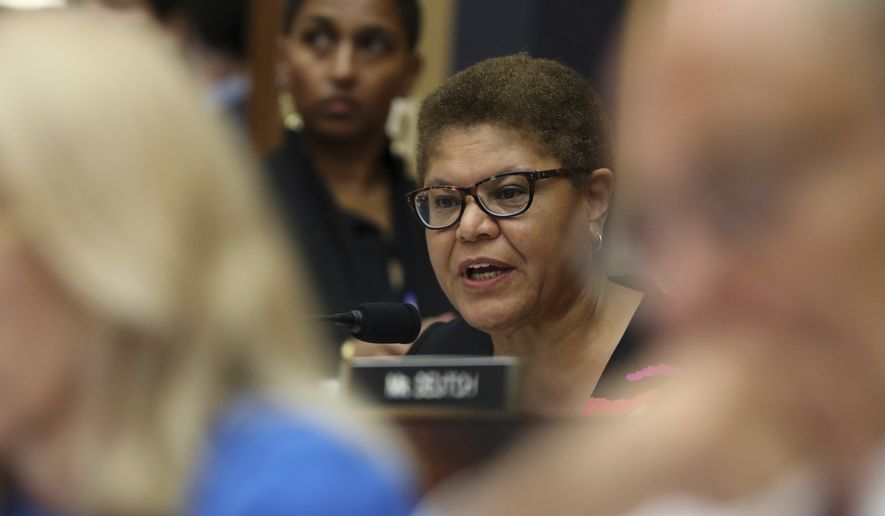 Rep. Karen Bass, D-Calif., asks questions to former special counsel Robert Mueller, as he testifies before the House Judiciary Committee hearing on his report on Russian election interference, on Capitol Hill, in Washington, Wednesday, July 24, 2019. (AP Photo/Andrew Harnik)
