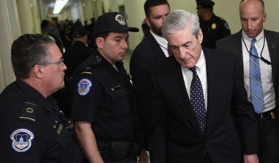 Former special counsel Robert Mueller arrives to testify on Capitol Hill in Washington, Wednesday, July 24, 2019, before the House Judiciary Committee hearing on his report on Russian election interference. (AP Photo/Susan Walsh)
