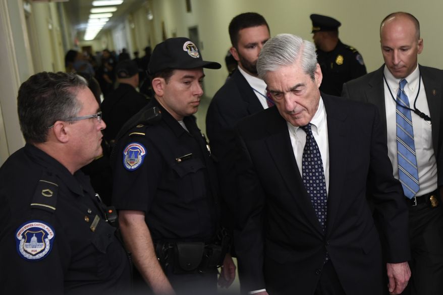 Former special counsel Robert Mueller arrives to testify on Capitol Hill in Washington, Wednesday, July 24, 2019, before the House Judiciary Committee hearing on his report on Russian election interference. (AP Photo/Susan Walsh)