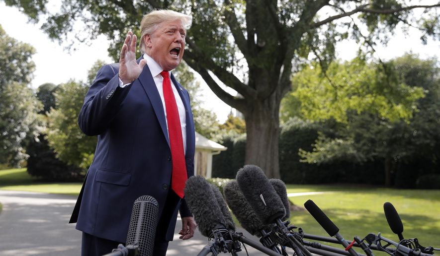 President Donald Trump speaks to members of the media at the White House in Washington, Wednesday, July 24, 2019, as he departs for a short trip to Andrews Air Force Base, Md., and onto Wheeling, W.Va., for a fundraiser. (AP Photo/Carolyn Kaster)
