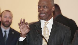 FILE - In this April 16, 2019, file photo, former U.S. Rep. J.C. Watts speaks at the state Capitol in Oklahoma City. The Oklahoma City-based charity Feed The Children and former CEO J.C. Watts have settled lawsuits against each other over Watts&#39; firing in 2016. (AP Photo/Sue Ogrocki, File)