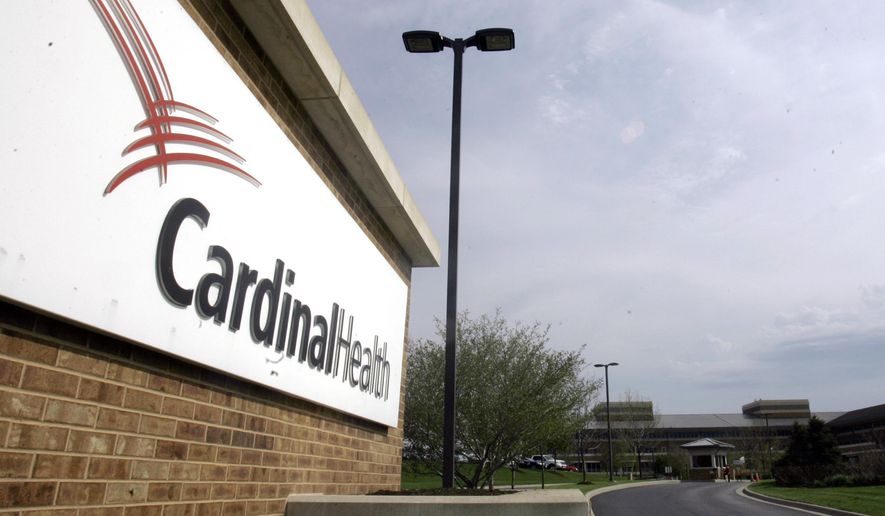 This April 30, 2007, file photo, shows the headquarters of Cardinal Health in Dublin, Ohio. An executive at Cardinal Health, one of the nation’s largest drug distribution companies, said in a legal proceeding that the business has no obligation to the public when it comes to shipping prescription opioid painkillers. That’s one of the disclosures in thousands of pages of court documents made public July 23, 2019, in lawsuits over the opioid crisis. (AP Photo/Kiichiro Sato, File)