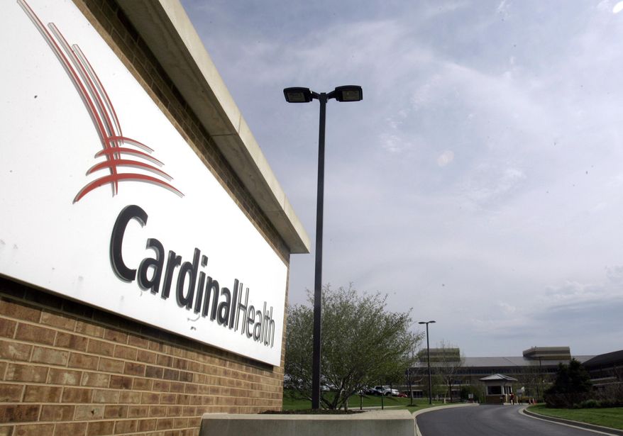 This April 30, 2007, file photo, shows the headquarters of Cardinal Health in Dublin, Ohio. An executive at Cardinal Health, one of the nation’s largest drug distribution companies, said in a legal proceeding that the business has no obligation to the public when it comes to shipping prescription opioid painkillers. That’s one of the disclosures in thousands of pages of court documents made public July 23, 2019, in lawsuits over the opioid crisis. (AP Photo/Kiichiro Sato, File)