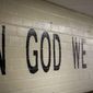&quot;In God We Trust&quot; is stenciled in a wall at South Park Elementary in Rapid City, South Dakota in this July 23, 2019, photo. (Adam Fondren/Rapid City Journal via AP) **FILE**