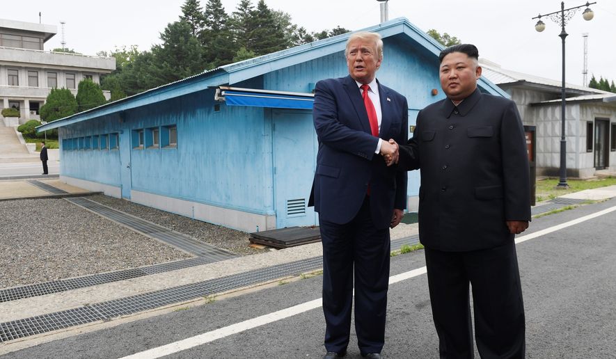 President Donald Trump meets with North Korean leader Kim Jong-un at the border village of Panmunjom in the Demilitarized Zone, South Korea, Sunday, June 30, 2019. (AP Photo/Susan Walsh) **FILE**