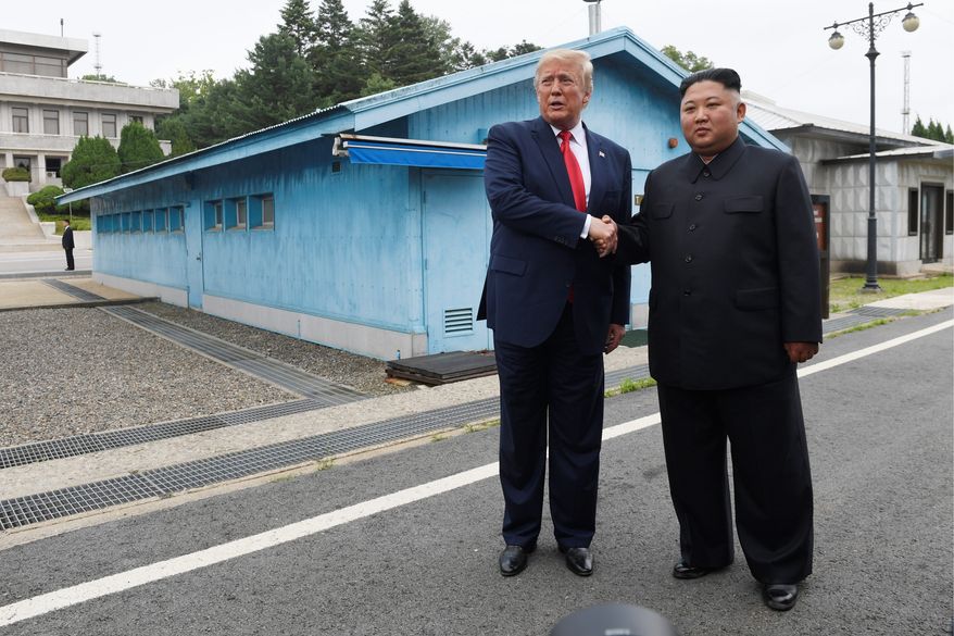 President Donald Trump meets with North Korean leader Kim Jong-un at the border village of Panmunjom in the Demilitarized Zone, South Korea, Sunday, June 30, 2019. (AP Photo/Susan Walsh) **FILE**