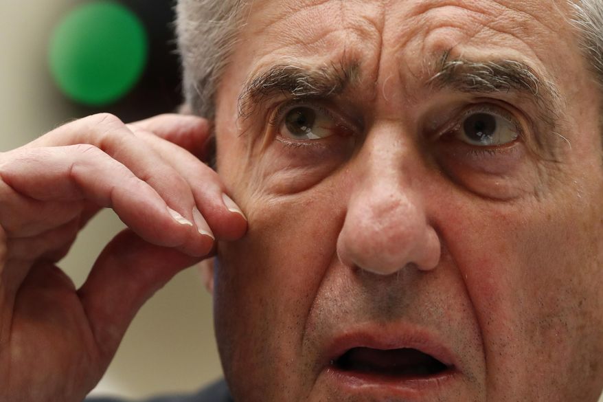 Former special counsel Robert Mueller testifies before the House Intelligence Committee hearing on his report on Russian election interference, on Capitol Hill, Wednesday, July 24, 2019, in Washington. (AP Photo/Alex Brandon)
