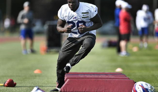 Buffalo Bills running back Frank Gore runs a drill during practice at the NFL football team&#x27;s training camp in Pittsford, N.Y., Thursday, July 25, 2019. (AP Photo/Adrian Kraus)