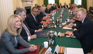 Boris Johnson, centre left, holds his first Cabinet meeting as Britain's prime minister on Thursday, July 25, 2019, pledging to break the Brexit impasse that brought down predecessor Theresa May.  Cabinet members, from left, Esther McVey, James Cleverly, Alun Cairns, and at right Minister for the Cabinet Office Oliver Dowden.  (Aaron Chown/Pool via AP)