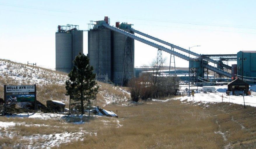 In a Jan. 21, 2016, file photo, the Belle Ayr Mine stands near Gillette, Wyo. Two coal mines in Wyoming and one in West Virginia owned by a company in bankruptcy could reopen if a judge approves a purchase offer. Court documents show Bristol, Tennessee-based Contura Energy has offered $20.6 million for the mines owned by Milton, West Viginia-based Blackjewel LLC. The mines have been closed since Blackjewel filed for bankruptcy July 1, 2019. (AP Photo/Mead Gruver, File) **FILE**