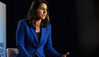 Rep. Tulsi Gabbard, D-Hawaii, speaks at the AARP Presidential Candidates Forum at the Hotel at Kirkwood Center in Cedar Rapids, Iowa, on Wednesday, July 17, 2019. (Olivia Sun/The Des Moines Register via AP)
