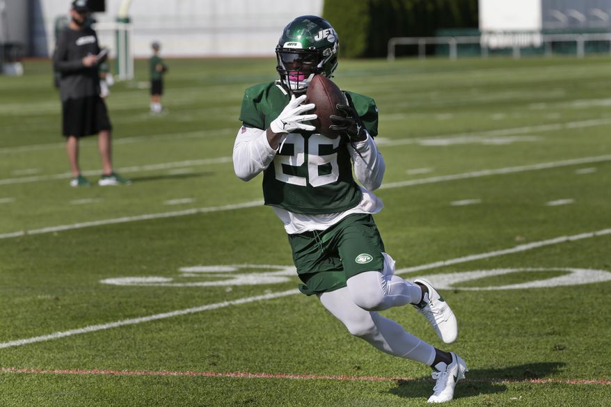 New York Jets running back Le'Veon Bell participates during practice at the NFL football team's training camp in Florham Park, N.J., Thursday, July 25, 2019. (AP Photo/Seth Wenig) **FILE**