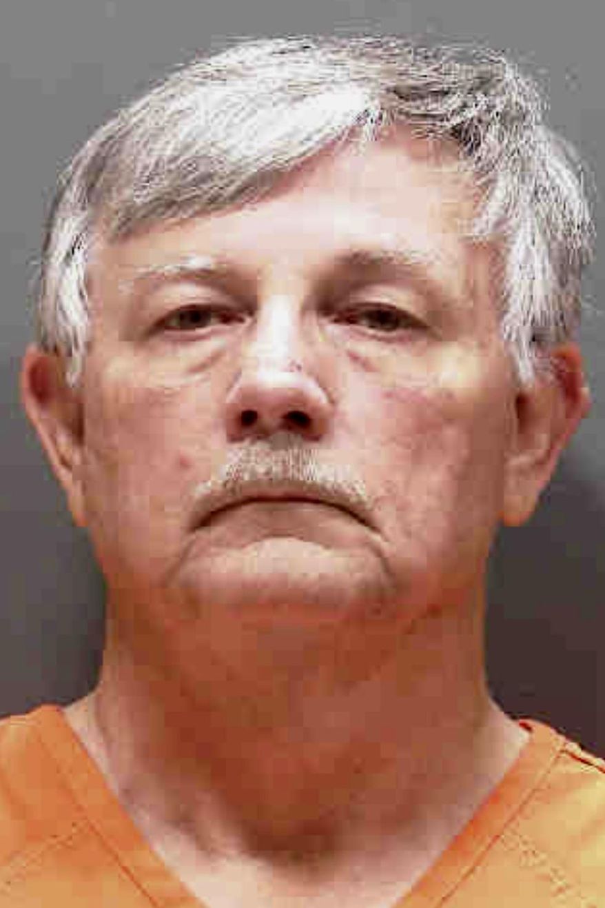 In this July 2019 photo released by the Sarasota County Sheriff's Department shows minister Charles Andrews in a booking photo, in Fla. Andrews, 66, is charged with 500 felony counts of possession of child pornography and three counts of failing to meet sex offender requirements.(Sarasota County Sheriff's Department via AP)