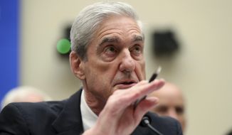 In this file photo, former special counsel Robert Mueller testifies before the House Intelligence Committee hearing on his report on Russian election interference, on Capitol Hill, in Washington, Wednesday, July 24, 2019. (AP Photo/Andrew Harnik)   **FILE**