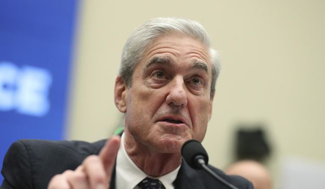 Former special counsel Robert Mueller testifies before the House Intelligence Committee hearing on his report on Russian election interference, on Capitol Hill, in Washington, Wednesday, July 24, 2019. (AP Photo/Andrew Harnik) ** FILE **