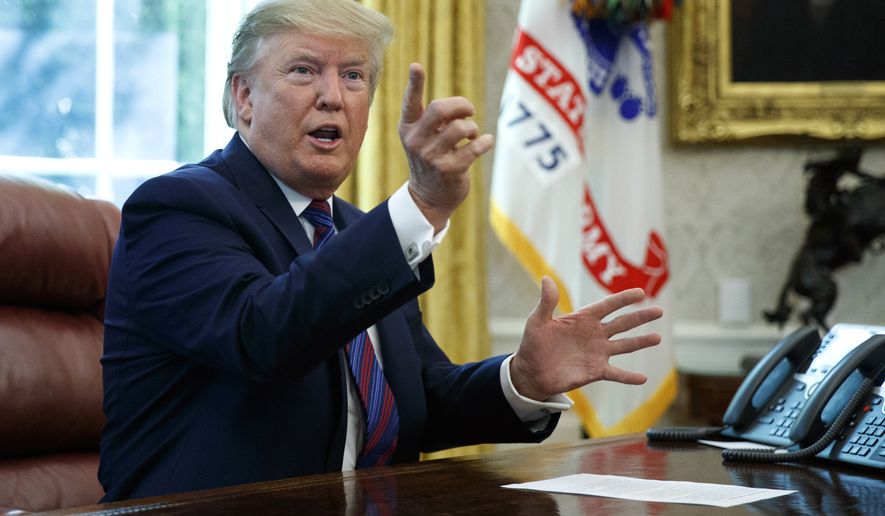 President Donald Trump speaks in the Oval Office of the White House in Washington, Friday, July 26, 2019. Trump announced that Guatemala is signing an agreement to restrict asylum applications to the U.S. from Central America.(AP Photo/Carolyn Kaster)