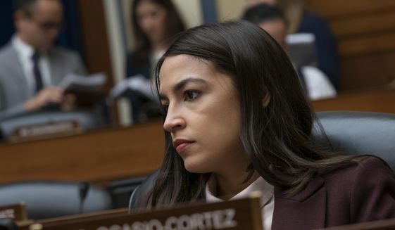 Rep. Alexandria Ocasio-Cortez, D-N.Y., attends a House Oversight Committee hearing on high prescription drugs prices on Capitol Hill in Washington, Friday, July 26, 2019. (AP Photo/J. Scott Applewhite) ** FILE **