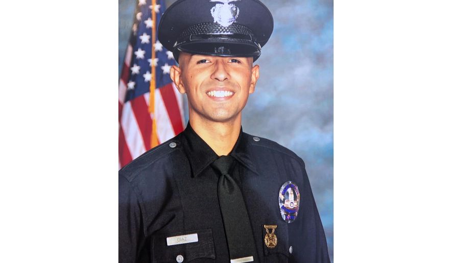 This image released by Los Angeles Police Department shows officer Juan Diaz. Authorities have identified Diaz as the off-duty Los Angeles police officer who was killed early Saturday, July 27, 2019. Acting Police Chief Beatrice Girmala said a civilian flagged down a motorcycle officer at around 1 a.m. Saturday and reported shots fired. The officer found two men had been shot. The off-duty officer died from his wounds and the other man was hospitalized in unknown condition. (Los Angeles Police Department via AP)
