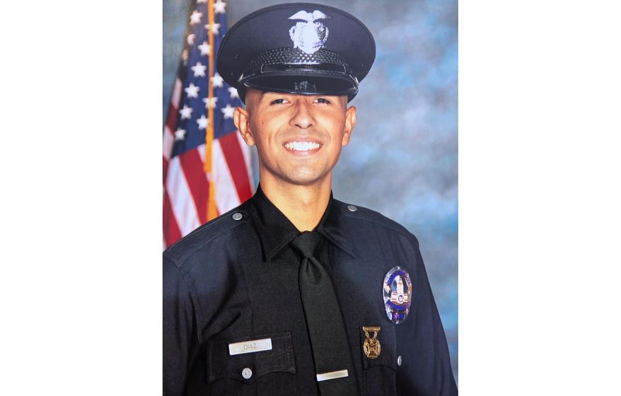 This image released by Los Angeles Police Department shows officer Juan Diaz. Authorities have identified Diaz as the off-duty Los Angeles police officer who was killed early Saturday, July 27, 2019. Acting Police Chief Beatrice Girmala said a civilian flagged down a motorcycle officer at around 1 a.m. Saturday and reported shots fired. The officer found two men had been shot. The off-duty officer died from his wounds and the other man was hospitalized in unknown condition. (Los Angeles Police Department via AP)