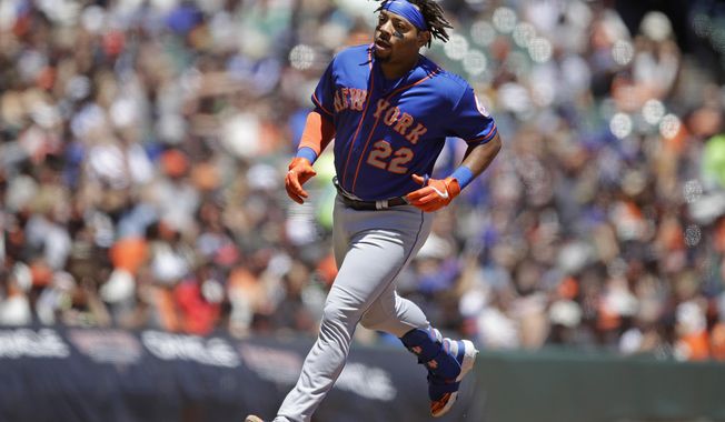 New York Mets&#x27; Dominic Smith runs the bases after hitting a home run off San Francisco Giants&#x27; Jeff Samardzija in the second inning of a baseball game Saturday, July 20, 2019, in San Francisco. (AP Photo/Ben Margot)