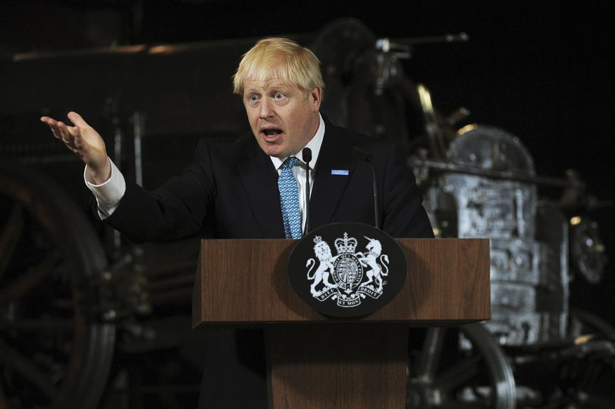 Britain's Prime Minister Boris Johnson during a speech on domestic priorities at the Science and Industry Museum in Manchester, England, Saturday July 27, 2019. Economists have warned that leaving the European bloc without an agreement in under 100-days would disrupt trade to impact on finances and investment. (AP Photo/Rui Vieira)