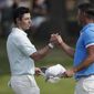 Rory McIlroy, of Northern Ireland, left, shakes hands Brooks Koepka after Koepka won the final round of the World Golf Championships-FedEx St. Jude Invitational, Sunday, July 28, 2019, in Memphis, Tenn. (AP Photo/Mark Humphrey) **FILE**