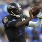 Baltimore Ravens quarterback Robert Griffin III catches a pass during NFL football training camp Saturday, July 27, 2019, in Baltimore. (AP Photo/Gail Burton)