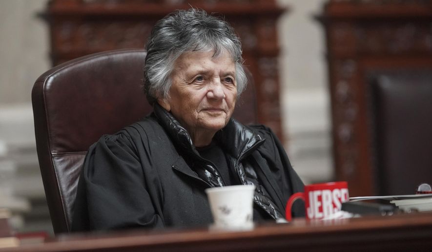 FILE - In this Wednesday, May 15, 2019, file photo, Wisconsin Supreme Court Justice Shirley Abrahamson is recognized by other justices after the conclusion of her last oral arguments at the Wisconsin State Capitol in Madison. Brian Hagedorn's inauguration as a Wisconsin Supreme Court justice both marks the end of a legal era and starkly illustrates the power governors have to reshape the state's judiciary. Hagedorn will be sworn in Aug. 1, replacing the retiring Abrahamson, Wisconsin's longest serving justice and the state Supreme Court's first female member. (Steve Apps/Wisconsin State Journal via AP, File)
