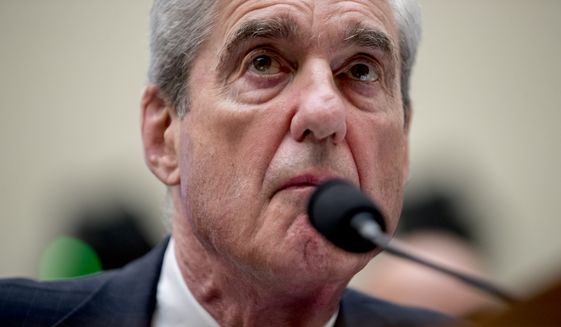 Former special counsel Robert Mueller testifies before the House Intelligence Committee hearing on his report on Russian election interference, on Capitol Hill, in Washington, Wednesday, July 24, 2019. (AP Photo/Andrew Harnik)