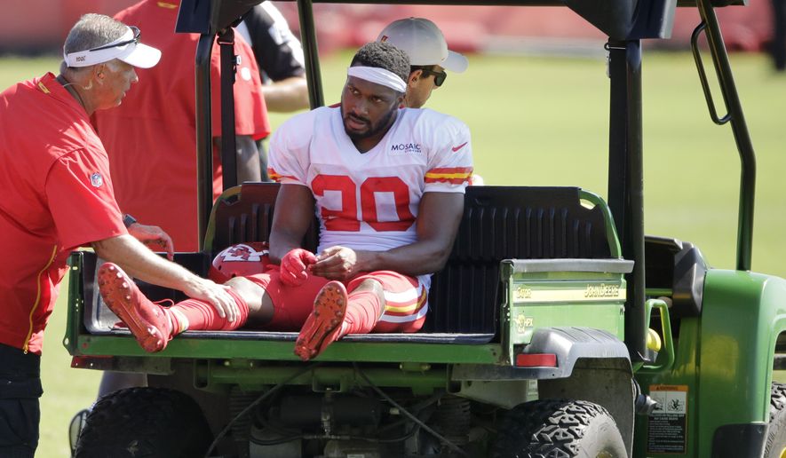 Kansas City Chiefs cornerback Keith Reaser (20) is carted off the field after being injured during NFL football training camp Monday, July 29, 2019, in St. Joseph, Mo. (AP Photo/Charlie Riedel)