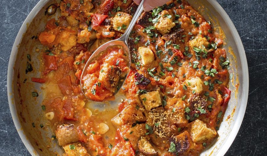 This undated photo provided by America's Test Kitchen in July 2019 shows Summer Tomato Gratin in Brookline, Mass. This recipe appears in the cookbook "Vegetables Illustrated." (Carl Tremblay/America's Test Kitchen via AP)