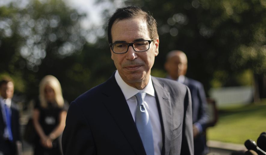 FILE - In this July 24, 2019, file photo Treasury Secretary Steve Mnuchin walks away from the microphones after speaking to members of the media at the White House in Washington. The Treasury Department says it expects to borrow $433 billion in the current July-September quarter. (AP Photo/Pablo Martinez Monsivais, File)