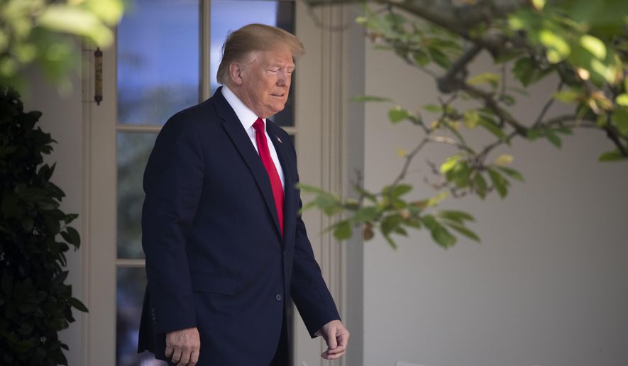 President Donald Trump arrives before signing H.R. 1327, an act ensuring that a victims' compensation fund related to the Sept. 11 attacks never runs out of money, in the Rose Garden of the White House, Monday, July 29, 2019, in Washington. (AP Photo/J. Scott Applewhite)